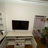 Photo 8: Master Bedroom - TV, drawers and railing