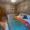 Photo 9: Garden bedroom - Clothing rail