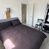 Photo 3: Bedroom 2 with hanging unit