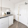 Photo 2: Fridge freezer, toaster, kettle, microwave and induction plug in hob provided.