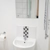 Photo 4: Humidity tracking fan and heated towel rail as standard