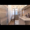 Photo 2: Toilet next to room