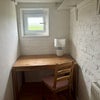 Photo 5: Office chair and reading lamp being organised.