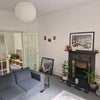 Photo 1: Living room and dining room