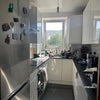 Photo 6: Induction hob, large fridge, microwave, air fryer, and dishwasher included