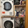 Photo 7: Separate high-spec washer and dryer units + plenty of cleaning supplies