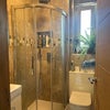Photo 8: Handheld and rain showerheads are both fitted with water filters- better for skin and hair!