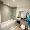 Photo 6: Bathroom with bath & shower