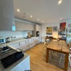 Photo 4: Shared living room/kitchen