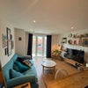 Photo 5: Shared living room/kitchen