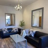 Photo 4: Shared living room space