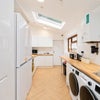 Photo 7: Your dream kitchen and laundry room!
