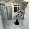 Photo 3: sole kitchen use and shared washing machine