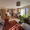 Photo 6: Shared kitchen, dining and living area