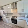 Photo 4: Modern fully fitted kitchen