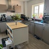 Photo 2: Open plan kitchen with island