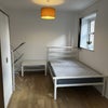 Photo 7: Double bed in large room.