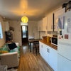 Photo 5: Kitchen and living area