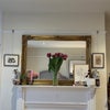 Photo 4: The lovely mantle piece in the room