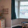 Photo 3: Bedroom 1 - small double bed, wardrobe, bedside cabinet
