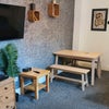 Photo 2: Spacious communal area wwith 2 sofas, dining table, smart TV with Netflix