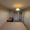 Photo 3: Room 1: There's a large chest of drawers which can take the place of the desk and chair if preferred