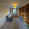 Photo 7: Room 2: Sofa, optional desk area with chair, wardrobe. Room for 2 optional clothes rails alongside.