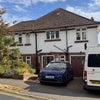 Photo 6: Street view of house