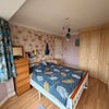 Photo 2: Room 1 - king size bed with walk to wall built in storage 