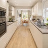 Photo 4: Communal Kitchen/Dining Area