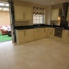Photo 9: kitchen where washing machine is located