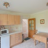 Photo 6: Kitchen leading to hallway
