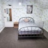 Photo 1: Room 4 is a comfortable double bedroom on the second floor. There is a wash basin in the room. The s