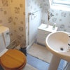 Photo 5: The separate shower room and separate toilet are shared with 1 other room, next door only.