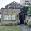 Photo 3: Front of house 