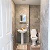 Photo 3: Modern bathroom located directly next to the bedroom, providing added privacy and convenience.