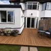 Photo 7: Lovely relaxing decking, lots more flowers now with extra seating and a 30meter garden.