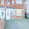 Photo 2: Front parking
