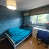 Photo 2: Windows with pullable blinds with great outside view.