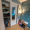 Photo 8: Adjoined single wardrobe with shelves.