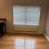 Photo 5: The Living Room with Blinds + Chairs + Radiator