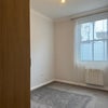 Photo 6: The Bedroom (window + radiator + carpet)