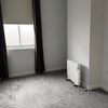 Photo 9: Second bedroom – window + radiator