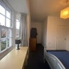 Photo 2: Second Bedroom