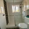 Photo 7: Bright modern bathroom with power shower