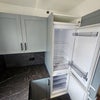 Photo 7: Kitchen storage & fridge freezer