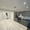 Photo 8: Open plan kitchen 