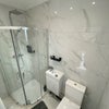Photo 3: Toilet standing shower downstairs 