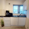 Photo 4: Fridge freezer, toaster, kettle, microwave and induction plug in hob provided.