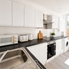 Photo 9: Communal Kitchen